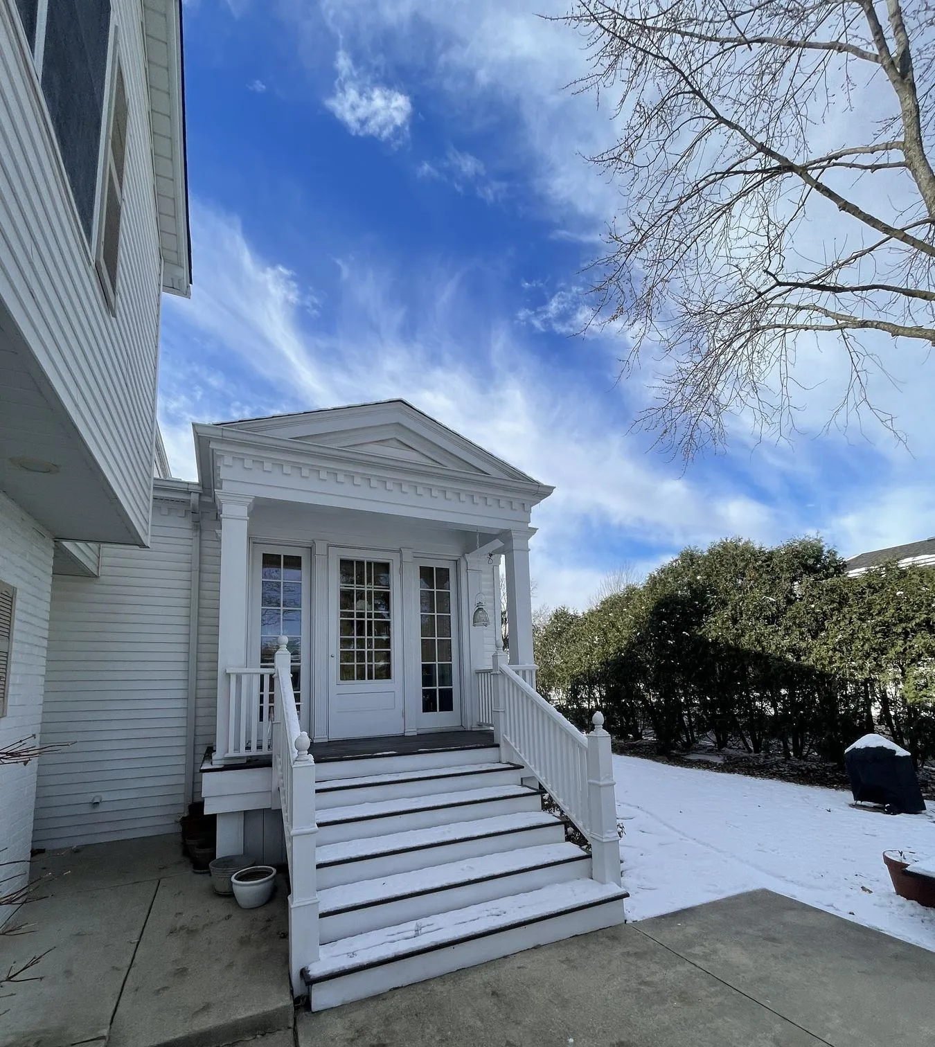 Entry porch and steps on the side of the addition