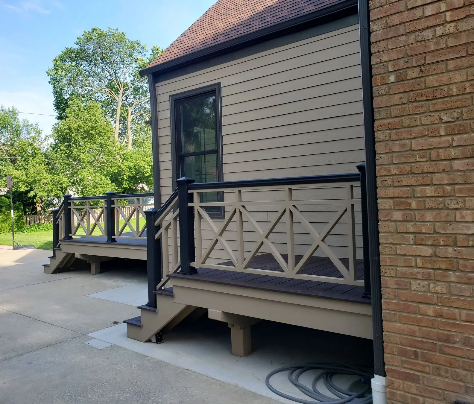 Side of the addition with the deck and new siding